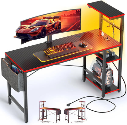 Gaming Desk with Power Outlets, 44 Inch Led Gamer Desk with 4 Tiers Reversible Shelves, PC Gaming Table with Headset Hook & Side Storage Bag for Bedroom (Black 3D Carbon Fiber)